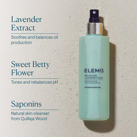 ELEMIS 6.7 fl oz bottle beside a common object to show true scale benefit