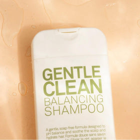 ELEVEN AUSTRALIA in-shower use with hands massaging scalp for effective buildup removal benefit