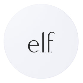 e.l.f. model applying powder outdoors showing polished daytime look