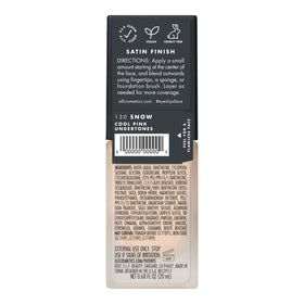 e.l.f. foundation in a makeup bag beside a mirror showing everyday use convenience