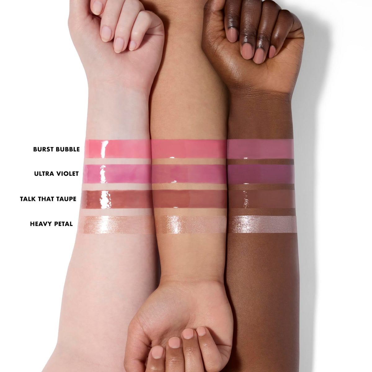 e.l.f. lip oils in hand for size comparison and portable, travel-friendly benefit