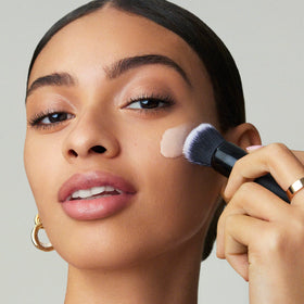e.l.f. primer swatch on hand demonstrating blendable finish and quick absorption