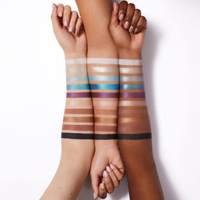 e.l.f. swatch row of blues and purples demonstrating intense color payoff