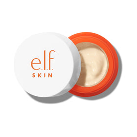 e.l.f. minis next to a coin for portable size comparison