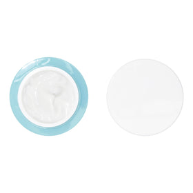 e.l.f. SKIN jar on a nightstand portraying overnight routine and dewy skin benefit