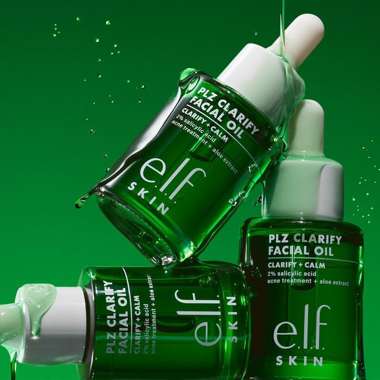 e.l.f. SKIN PLZ Clarify 1 oz bottle beside coin to show travel-friendly size
