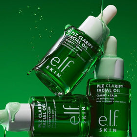 e.l.f. SKIN PLZ Clarify 1 oz bottle beside coin to show travel-friendly size