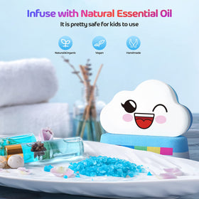 Elfinbay bath bomb fizzing in tub creating rainbow effect for playful baths