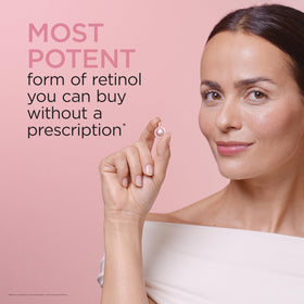Elizabeth Arden capsule in hand for scale showing compact single-dose convenience