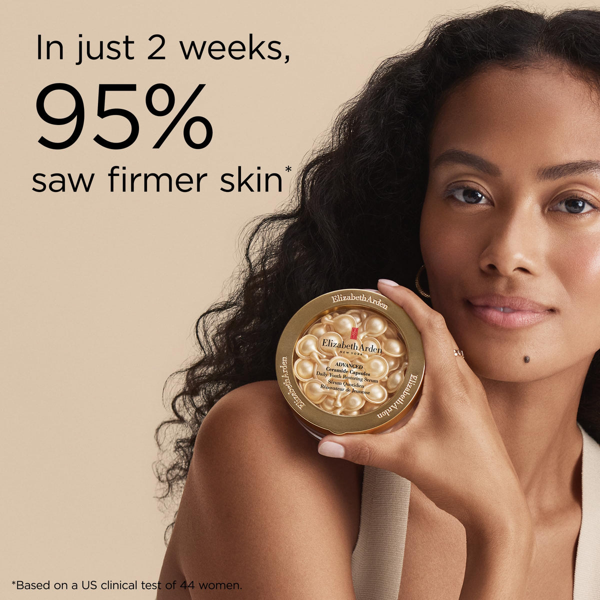 Elizabeth Arden capsule being twisted open to release pre-measured serum