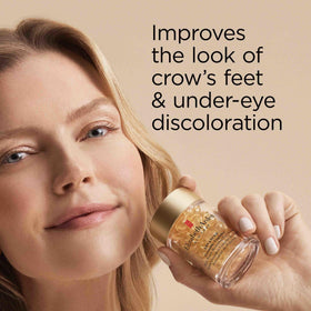 Elizabeth Arden demonstration applying serum around eye for smoothing benefit: gentle application