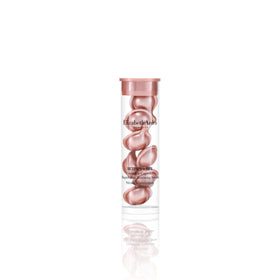Elizabeth Arden close-up of an opened capsule dispensing silky serum for smooth application