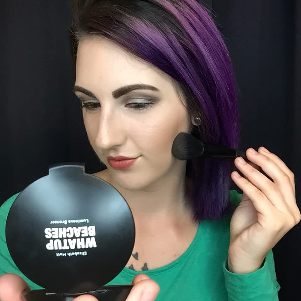 Elizabeth Mott brush applying bronzer for effortless contouring and warming