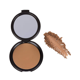 Elizabeth Mott compact held in hand to show true size and travel-friendly benefit
