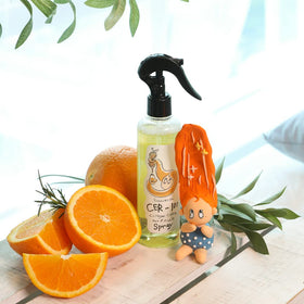 Elizavecca being sprayed onto damp hair to add softness and manageability benefit
