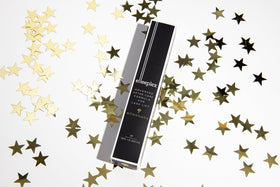 elleebana serum texture on fingertip showing lightweight finish and quick absorption benefit conditioning
