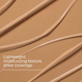 EltaMD applied under makeup demonstrating even base and non-greasy feel