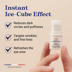 Hand applying Embryolisse Radiant Eye Stick under eye demonstrating precise targeted use