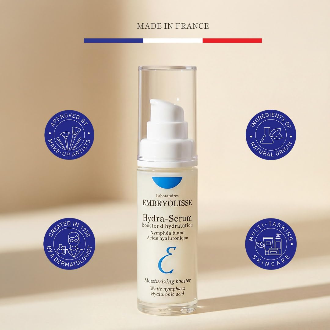 Embryolisse bottle placed next to a ruler showing compact 1.01 fl oz size