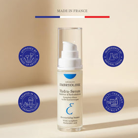 Embryolisse bottle placed next to a ruler showing compact 1.01 fl oz size