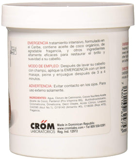 Model applying Emergencia Toque Magico to hair ends demonstrating added softness and shine