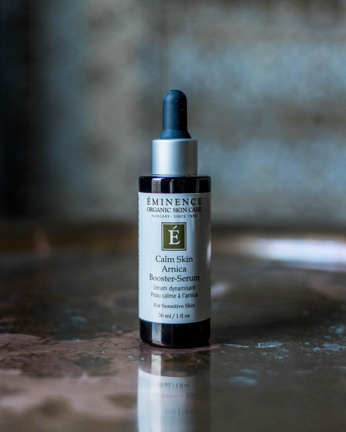 Eminence 1 oz bottle next to a ruler for size comparison and portability