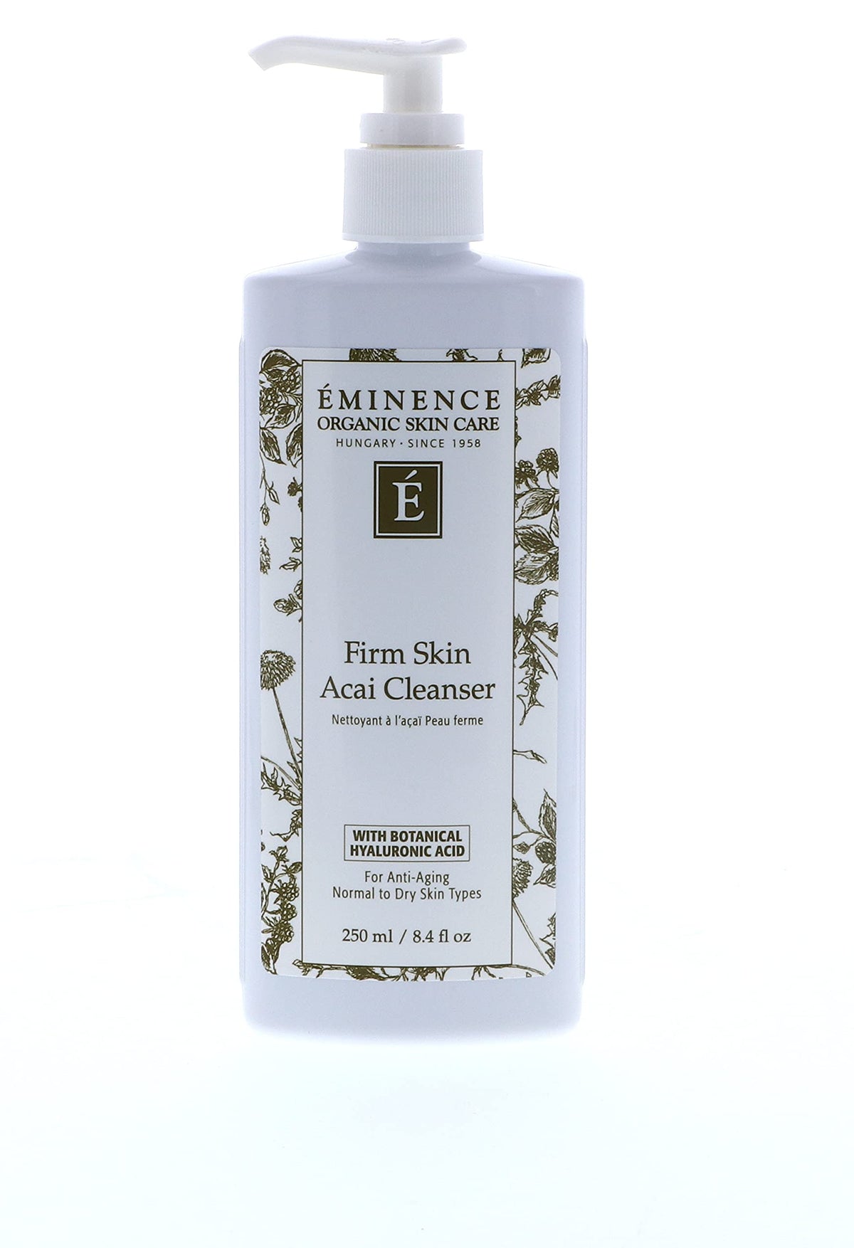 Eminence bottle next to serum and moisturizer showing layering compatibility
