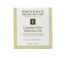 Eminence melted dab on fingertip close-up, shows smooth texture and easy spread