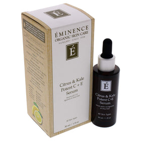 Eminence bottle in hand to show 1.01 fl oz scale and travel-friendly size
