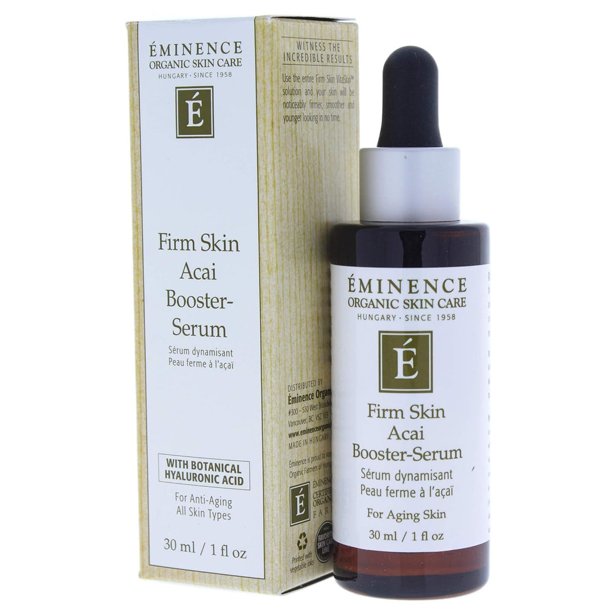 Eminence 1 oz bottle next to coin to show compact travel size