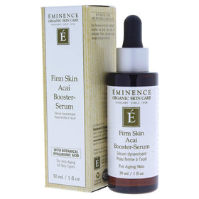 Eminence 1 oz bottle next to coin to show compact travel size