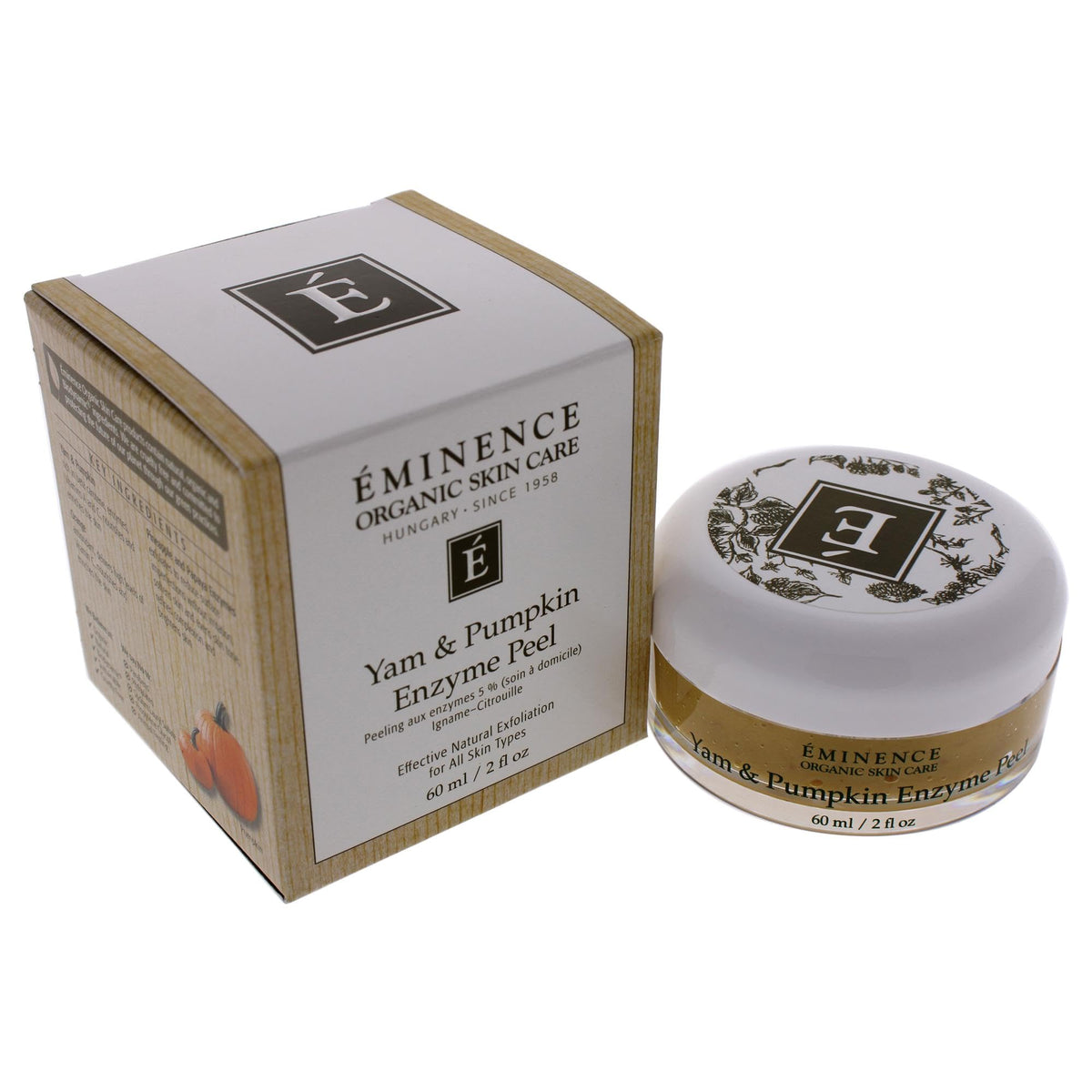 Eminence two-ounce jar next to a coin for scale showing compact travel-friendly size