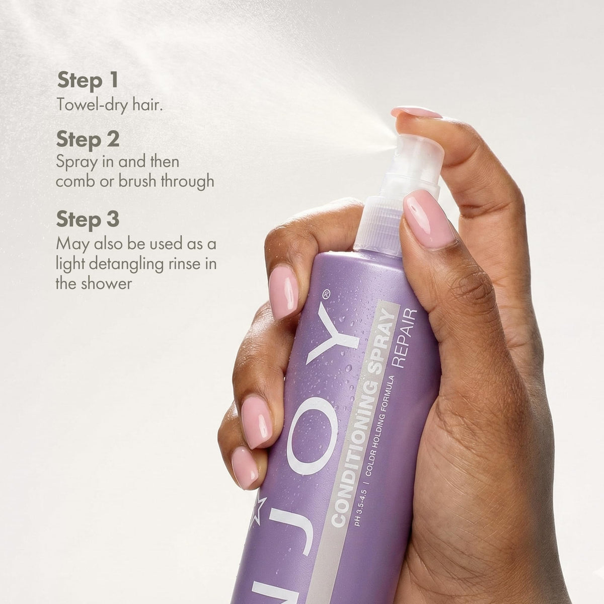 Enjoy bottle next to hand showing 10.1 fl oz size and travel practicality