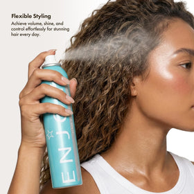 Enjoy finishing spray mist over hair showing lightweight texture and volume boost
