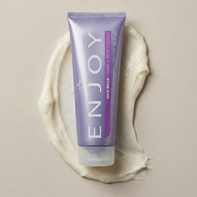 Enjoy hair mask rinsed hair shining under light, illustrates smoothing and shine