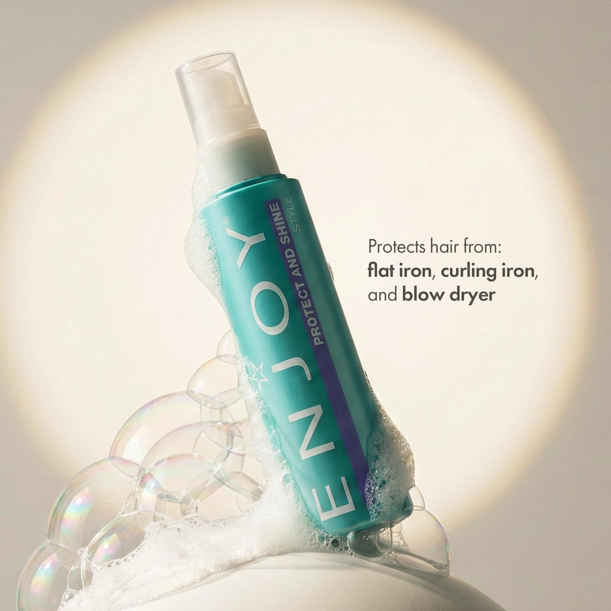 Enjoy serum being smoothed onto hair ends to reduce frizz and add shine