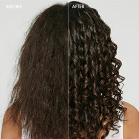 Enjoy shaping lotion applied on curly hair showing defined curls and enhanced bounce