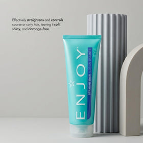 Enjoy straightener cream on a hand demonstrating texture and quick absorption benefit