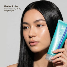 Enjoy straightener applied during blow-dry demonstrating easier styling and smoother results