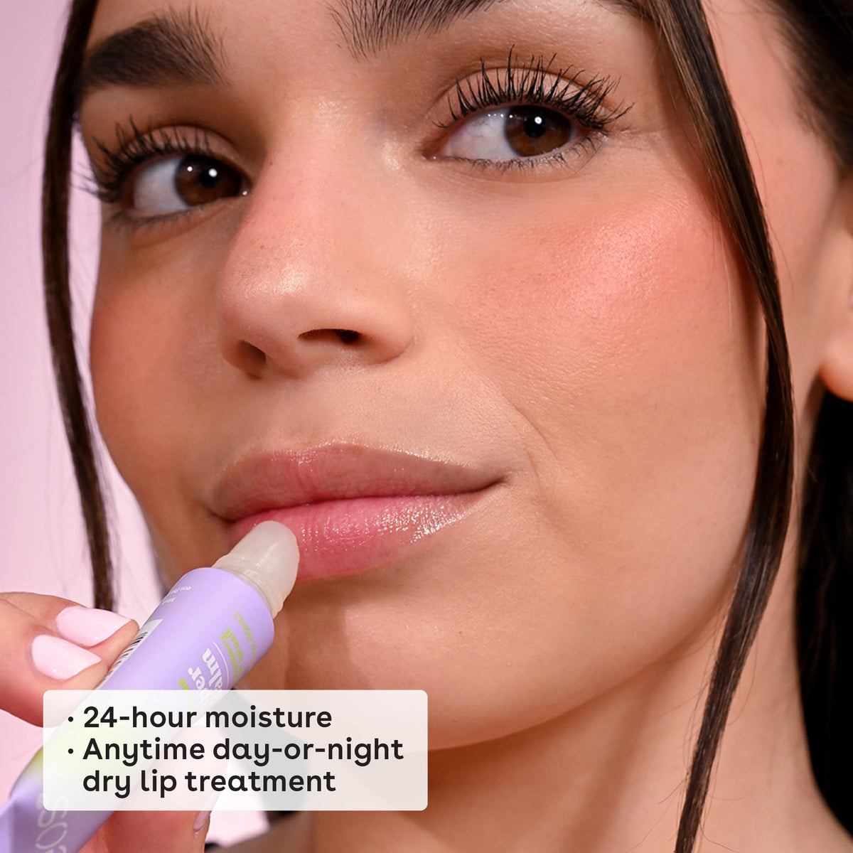 eos applying balm to lips demonstrating soothing, protective finish