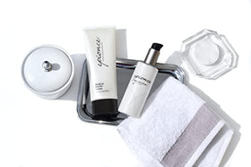 Epionce travel-ready flatlay with cleanser and accessories, highlighting portability and convenience