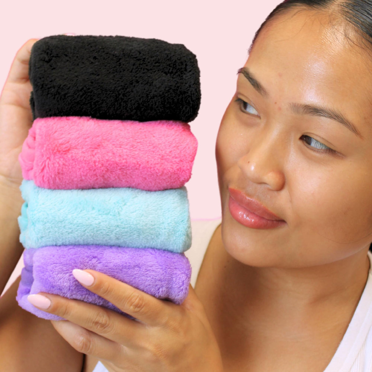 ERASE YOUR FACE wet cloth demonstration highlighting easy water-activated cleansing benefit