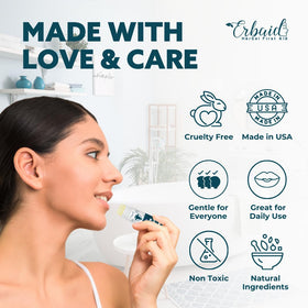 Erbaid compact balm beside keys showing pocket-friendly size