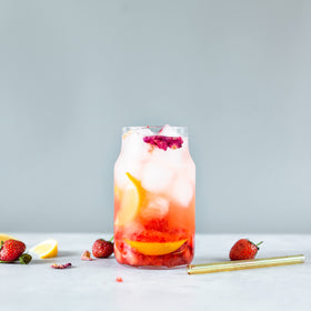 Erbology adding rose water to a cocktail for subtle floral flavor and aroma