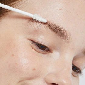 Ere Perez clear mascara on lashes showing lengthened look and subtle shine