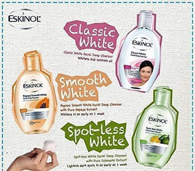 Eskinol cleanser bottle held in hand demonstrating travel-friendly 225mL size