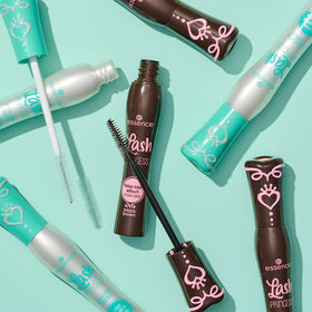 essence model applying mascara showing easy application and defined lash effect