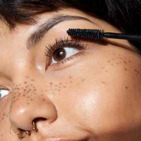 essence primer texture swatch showing creamy base that supports mascara