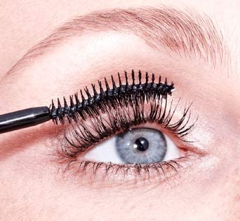 Essence Lash Princess next to pen for scale indicating travel-friendly size