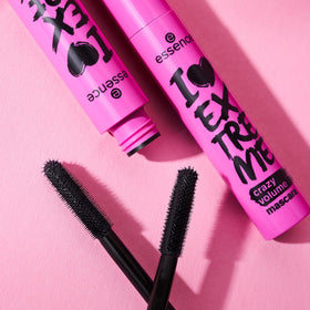 essence mascara scale next to ruler showing compact tube size for travel